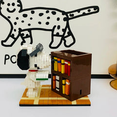 Beagle mit Bücherregal